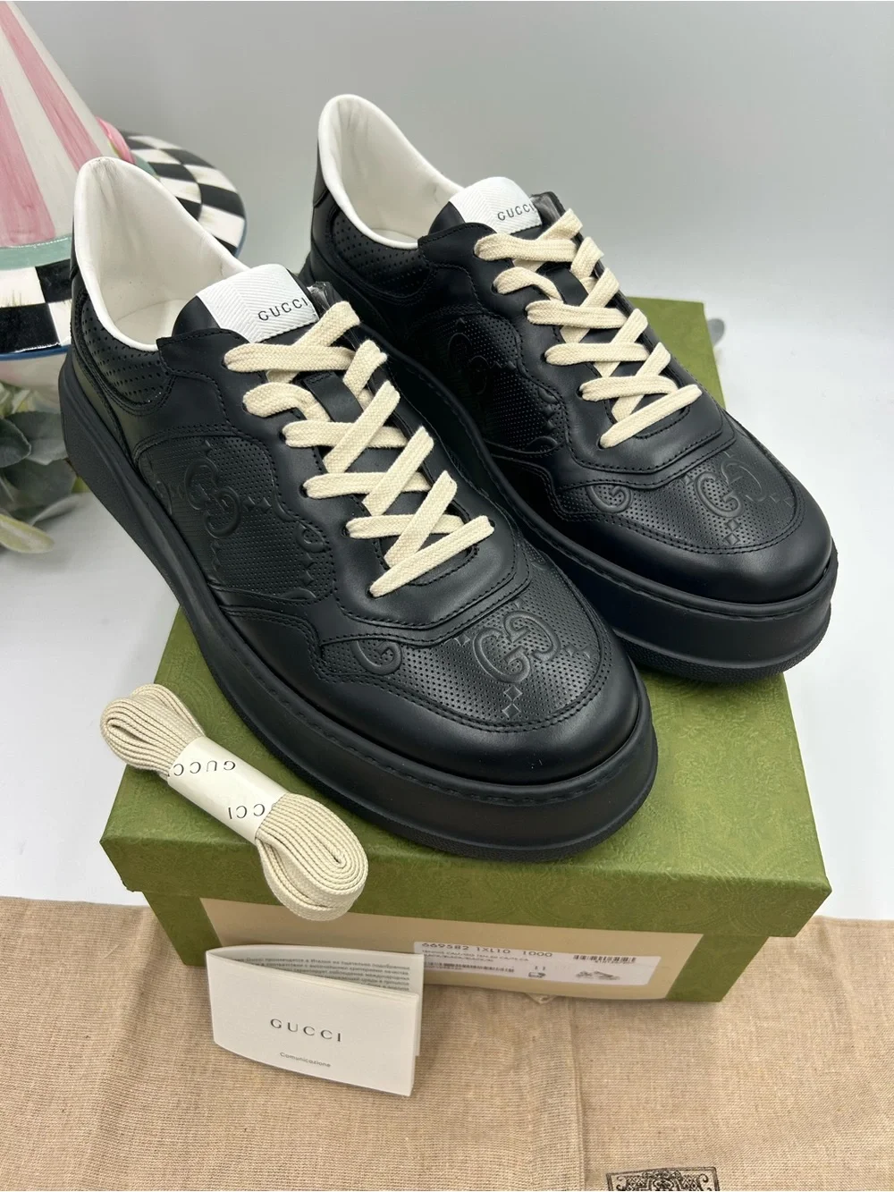 Men's Gucci, GG embossed leather sneakers size 11 fits 11.5 US made in Italy